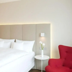 Отель NH Collection Frankfurt City 4* Улучшенный номер с различными типами кроватей фото 7