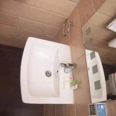 Отель Cotton Suites ванная