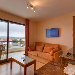 Отель Astuy Apartamentos Арнуэро комната для гостей фото 2