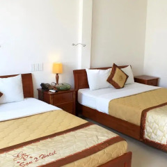 Giang Son 2 Hotel 2* Стандартный семейный номер с двуспальной кроватью фото 7
