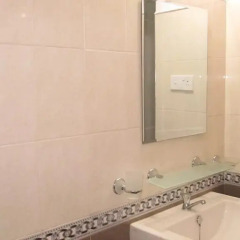 Отель Travel Lodge Lake View Tourist Resort ванная фото 2