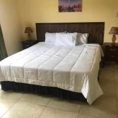 Отель Kingston Paradise Place Guesthouse Люкс с различными типами кроватей фото 21