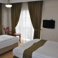 Basileus Hotel 3* Стандартный семейный номер разные типы кроватей фото 8