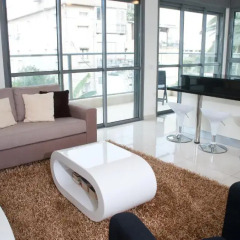 Апартаменты Ziv Apartments 8 Amos Street Тель-Авив комната для гостей фото 3