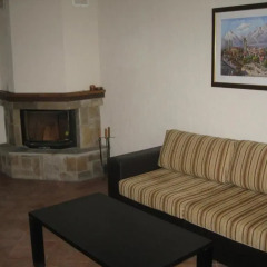 Апартаменты Tzanev Apartments - Bansko Банско комната для гостей фото 5