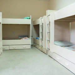 Mini-hotel "Ural" Кровать в общем номере с двухъярусной кроватью