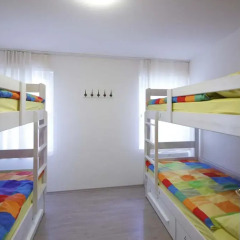 Pozitiv Hostel Кровать в общем номере с двухъярусной кроватью фото 16