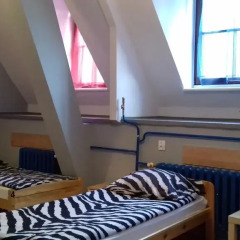 Hostel Universus i Apartament Кровать в общем номере с двухъярусными кроватями фото 14