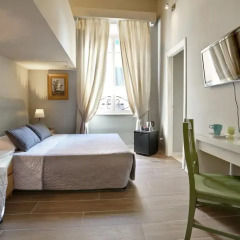 Отель AmoRoma Suite Стандартный семейный номер с двуспальной кроватью фото 2