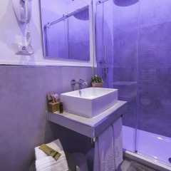 Отель Colonna Luxury Suites 4* Номер Делюкс с различными типами кроватей фото 18