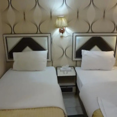 Al Kawakeb Hotel комната для гостей фото 8