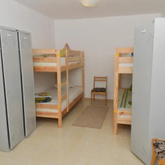 Гостиница Октябрьская Кровать в общем номере с двухъярусной кроватью фото 6