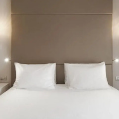 Отель NH Milano Touring 4* Улучшенный номер с различными типами кроватей фото 5