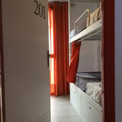Отель Hostelscat в номере фото 2