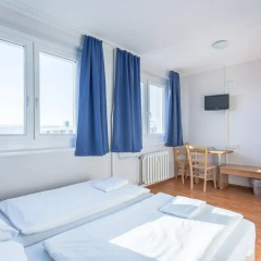 Отель a&o Dresden Hauptbahnhof 2* Стандартный номер с 2 отдельными кроватями фото 7