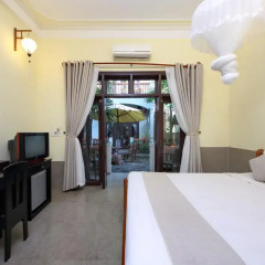 Отель Loc Phat Hoi An Homestay - Villa 2* Улучшенный номер с двуспальной кроватью фото 3