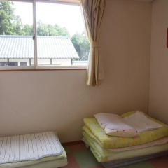 Отель Kumamoto Guesthouse Minami Aso Little Asia Минамиогуни комната для гостей