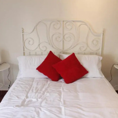 Отель Alveiros Apartamentos Praia dos Aveiros комната для гостей фото 2