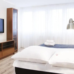 Отель Hosapartments City Center Улучшенные апартаменты с различными типами кроватей фото 3