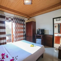 Отель Quang Xuong Homestay 2* Номер Делюкс с различными типами кроватей фото 4