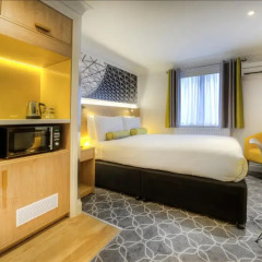 Отель Comfort Inn & Suites Kings Cross 3* Апартаменты