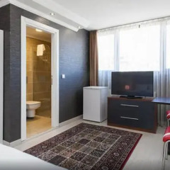 Отель Defne Suites Апартаменты с различными типами кроватей фото 31