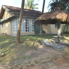Отель Ikram's Holiday Bungalow фото 2