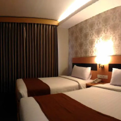 Отель Grand Puri Saron Yogyakarta 3* Номер Делюкс с 2 отдельными кроватями фото 2