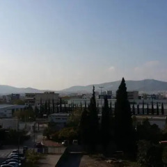 Апартаменты Sunsetia Apartment