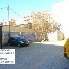 Отель Abadia Suites парковка