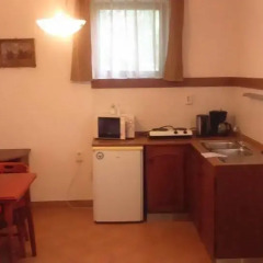 Отель Timpa Apartmanház & Dr. Strecker Villa в номере