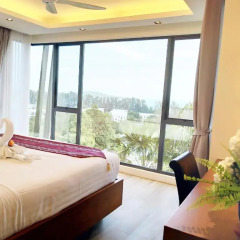 Отель At The Tree Condominium Phuket комната для гостей