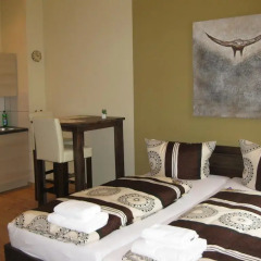 Апартаменты Apartment Central am Zoo в номере