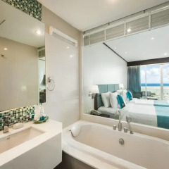Отель Andaman Beach Suites Пхукет ванная фото 2
