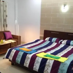 Отель Goconnect Homestay Улучшенный номер с различными типами кроватей