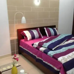 Отель Goconnect Homestay Улучшенный номер с различными типами кроватей фото 3