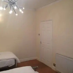 Отель South Park Cottage Стандартный семейный номер с различными типами кроватей (общая ванная комната) фото 18