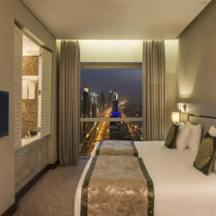 Millennium Plaza Hotel 5* Улучшенный номер с 2 отдельными кроватями фото 2