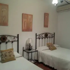 Отель Hostal El Canario Стандартный номер с двуспальной кроватью фото 11