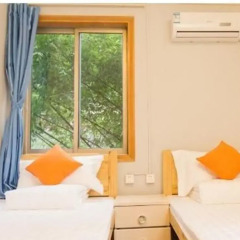 Zhuangse Chengdu Youth Hostel комната для гостей