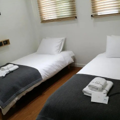 Отель YE'4 Guesthouse 2* Стандартный номер с 2 отдельными кроватями (общая ванная комната) фото 2
