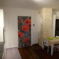 Отель Monolocale SuperAccessoriato Меран в номере фото 2