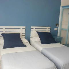 Отель Hostal Puerto Beach Стандартный номер с 2 отдельными кроватями