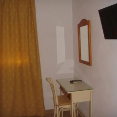 Отель Hostal Los Rosales удобства в номере