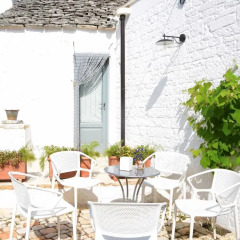Отель Corte Trullo Sovrano B&B Альберобелло питание