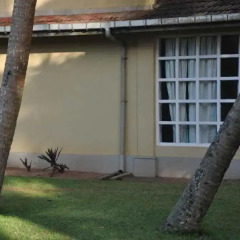 Отель Ikram's Holiday Bungalow
