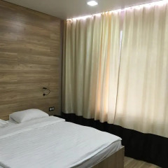 Гостиница Postoyaliy Dvor Inn в Уссурийске отзывы, цены и фото номеров - забронировать гостиницу Postoyaliy Dvor Inn онлайн Уссурийск комната для гостей фото 3