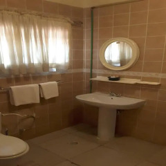 Отель La Playa Suites ванная фото 2