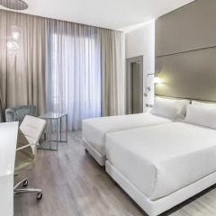 Отель NH Milano Touring 4* Улучшенный номер с различными типами кроватей фото 19