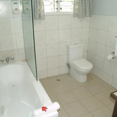 Отель Suva Motor Inn Фиджи, Вити-Леву - отзывы, цены и фото номеров - забронировать отель Suva Motor Inn онлайн ванная